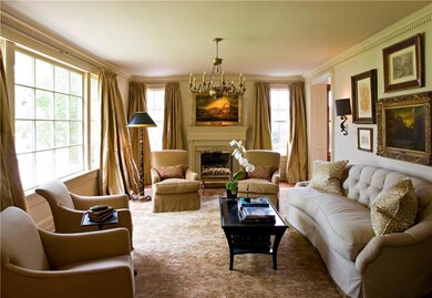 Formal Living Room with fireplace overlooking pres