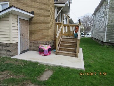 Rear entrance unit one and Outside basement Access