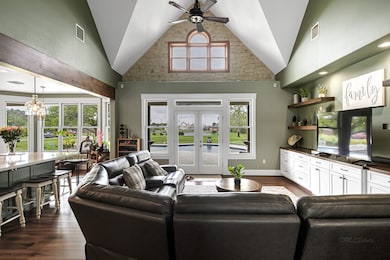 Large family room with great views of the pool and