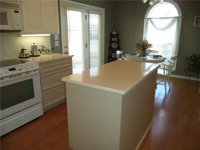 Kitchen with access to covered patio.