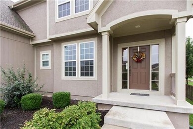 Greet your guests on the covered portico at front 