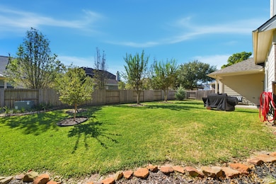 Talk about a spacious backyard! Well-loved and ready for its next owner to enjoy.