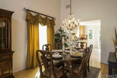 Formal dining room offers high ceiling, Surround s