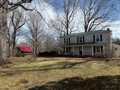 The Farmhouse and the Cabin