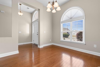 Interior space featuring a chandelier, visible ven