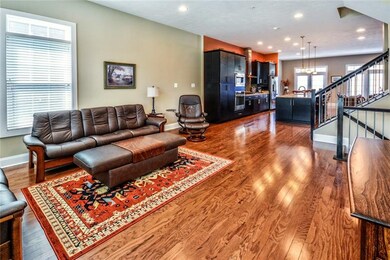 View of the entry way into the living room and kit