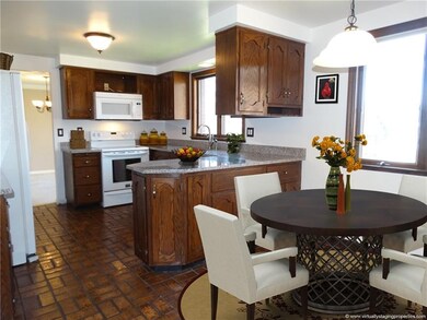 Large eat in kitchen with lots of counter space.