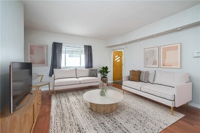 Bright, spacious living room. Photo shows furnitur