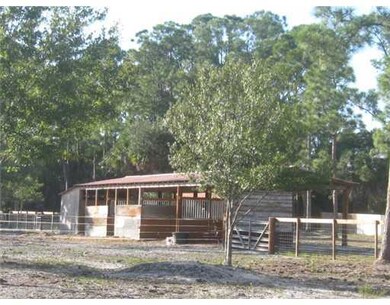 Stable/Barn. Pole Barn/Stable with 4 run in stalls