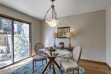 Spacious Eat In Kitchen opens to private patio