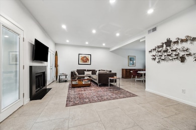 Living Room features 9' Ceilings, Dimmable Recesse