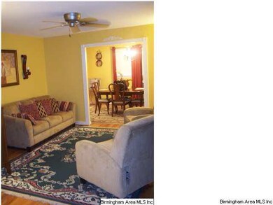 Lovely Living Room opening up to the Dining Room