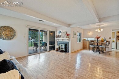 Spaces living room mountain views and walk-out to 
