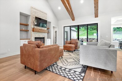 Vaulted great room with stone fireplace and gorgeo