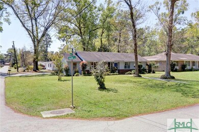 This brick ranch home sits on a 0.35 corner acre l
