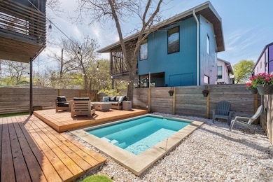 View of pool featuring an outdoor hangout area, a