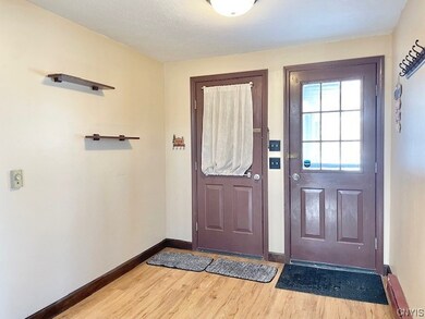 Looking back at entryway. Garage door to left.
