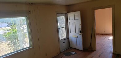 Front Living Area with large double pane window