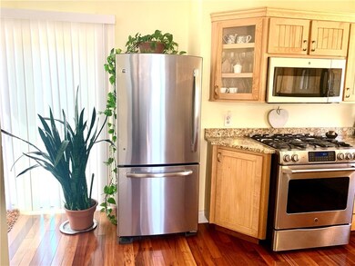 Beautiful appliances, gas stove, hardwoods and doo