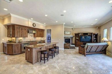 The kitchen opens to the family room and has great