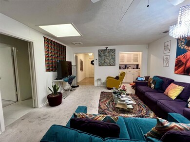 View of main living room and wet bar area.