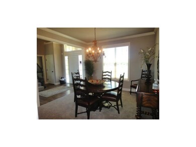 Spacious dining with chandelier