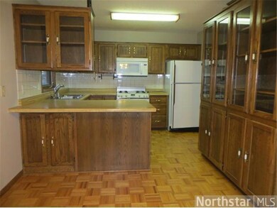 kitchen with many oak cupboards