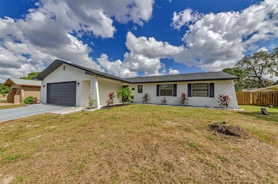 12920 Walnut Tree Ln, Hudson, FL 34669 - photo 5