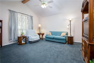 Large family room with vaulted ceiling, there is g