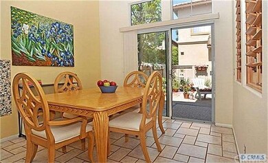Enjoy Looking Out to Lovely Rear Yard Patio Area W
