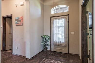 Bright & welcoming entry with a beautiful trey cei