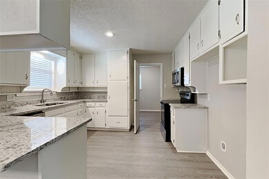 409 W Pleasantview Dr, Hurst, TX 76054 - photo 6