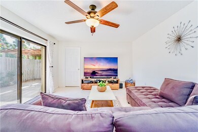 Living Room with Patio View Facing Downstairs Bedr