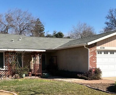 Property has gutters and downspouts for that occas