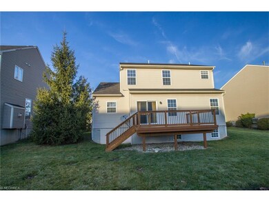 Back of house with custom deck