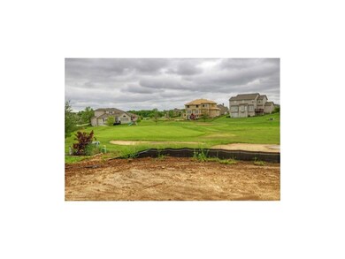 View from the outdoor living area! Par 3 hole. Jus