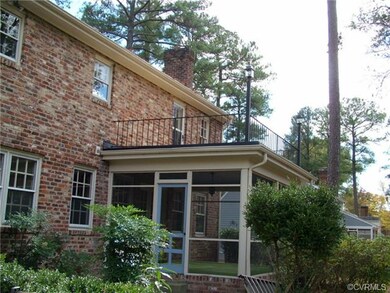 rear photo shows screened porch and deck on top of