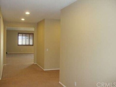 FRONT ENTRY LOOKING TOWARD FAMILY LIVING AREA WITH