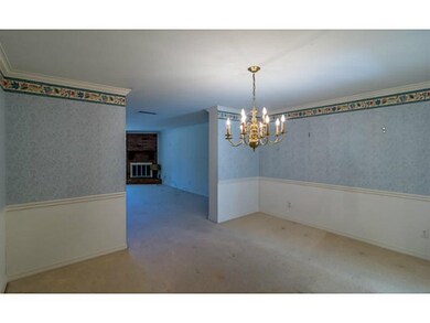 Dining Room. Dining room with carpet, chair railin