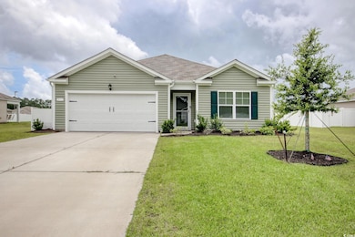 Ranch-style house featuring concrete driveway, an attached garage, and roof with shingles