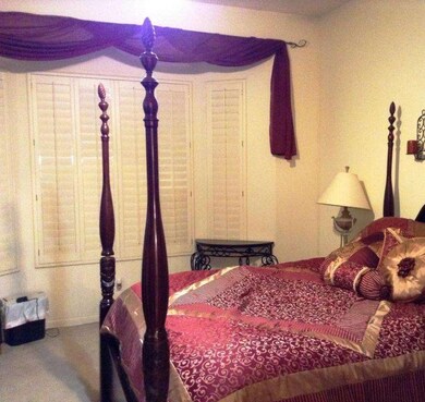 Master Bed with Shutters