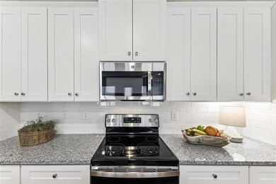 Kitchen featuring stainless steel appliances, ligh