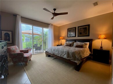 Master bedroom with views of outside sitting area