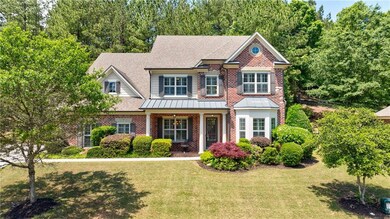 Craftsman inspired home with brick siding, a front