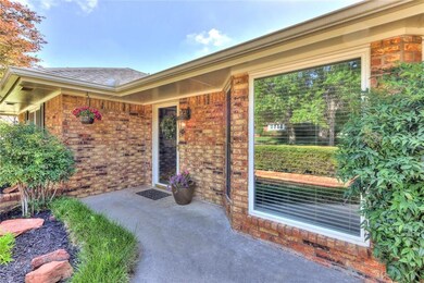Entry walk way, with established flower beds, mature shrubs, hostas, elephant ears, lantana and rocks hand selected, one-by-one, from varying parts of Oklahoma. A few sentimental ones are reserved but most will remain.