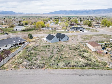 Aerial view of residential area with mountains