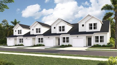 View of front of property with a garage and a fron