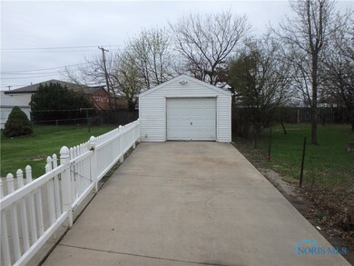 Garage and fenced back yard