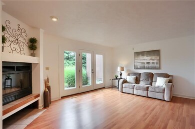 Huge living room with newer LVT flooring, a new pa