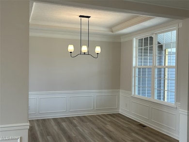 Formal dining room with beautiful trim accents.